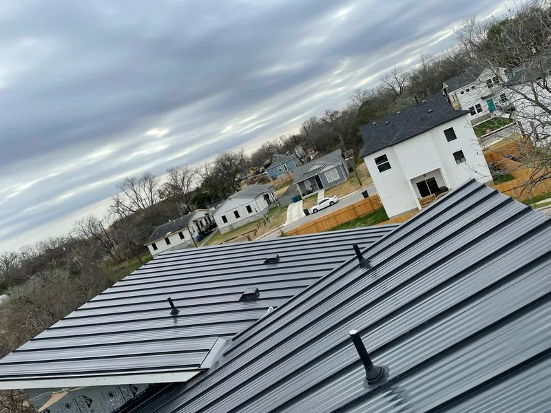 Standing seam metal roof panels with vents for Skylight Repair in Alexandria